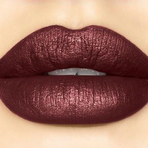 Sugarpill liquid lipstick in “Strange Love”.